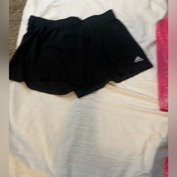One pair of Adidas, running shorts, large, and one Nike short set, medium - Picture 4 of 9